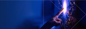 A hand with the index finger touching a fiber optic burst